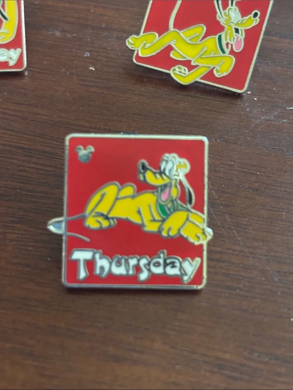 Disney Pluto Weekly Enamel Pin Set - Red and Yellow